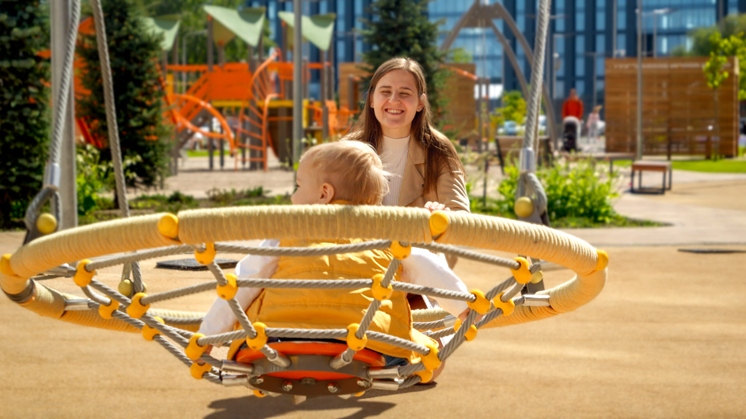 cheerful smiling mother looking at her toddler son 2023 11 27 04 54 04 utc