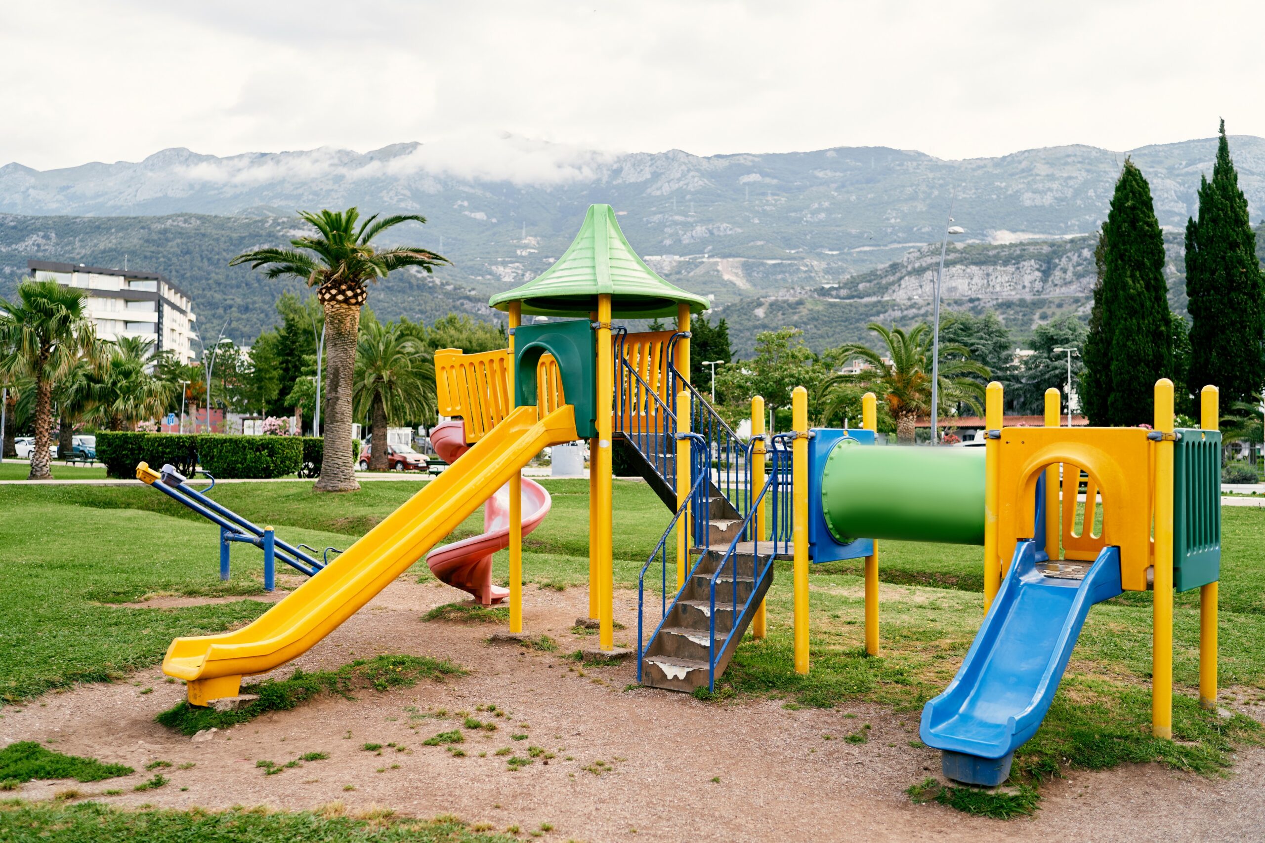 colorful playground with slides and swings in a gr 2023 11 27 05 06 41 utc (1)
