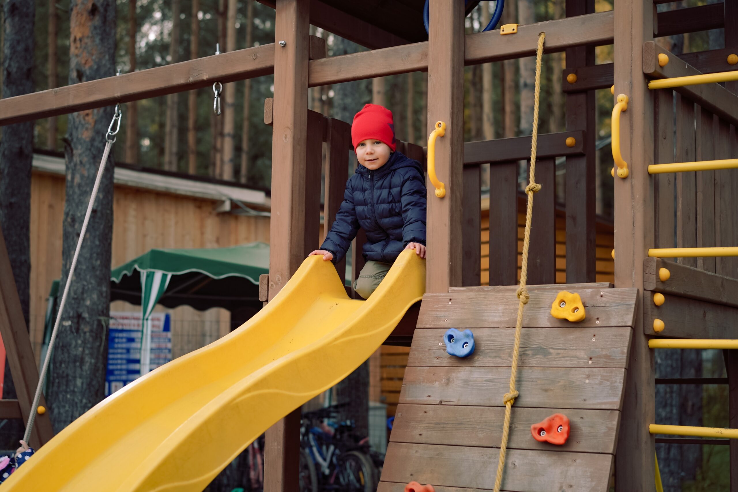 cute boy going to slide on playground 2023 11 27 04 56 14 utc