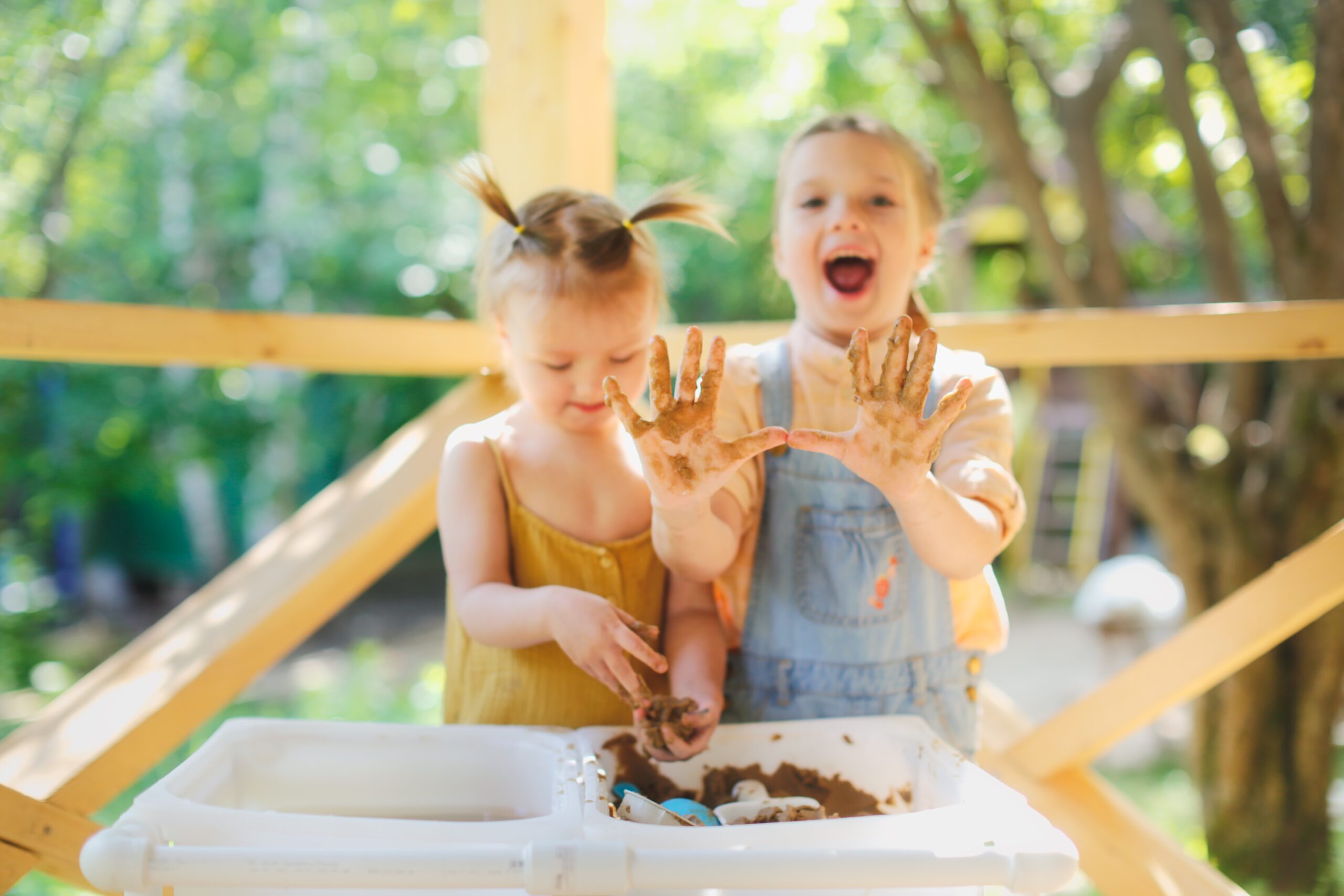 happy children play with sand and water in sensory 2023 11 27 05 28 57 utc
